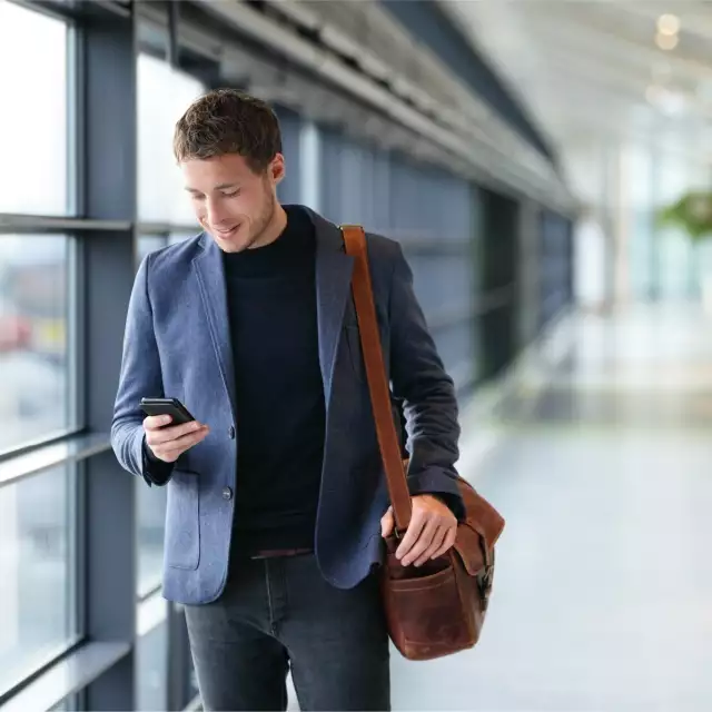 conga-man-checking-phone-streamline-documents