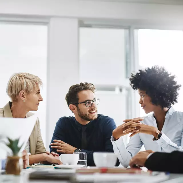 Group of people meeting over coffee