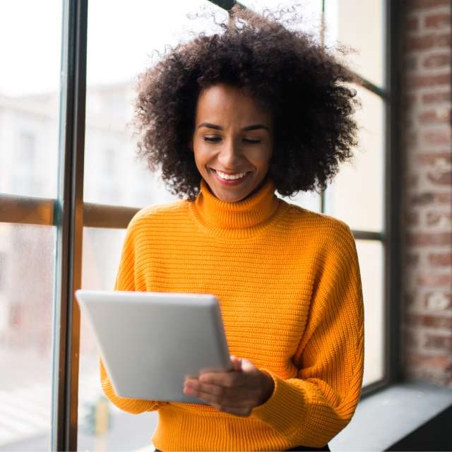 Woman looking at tablet