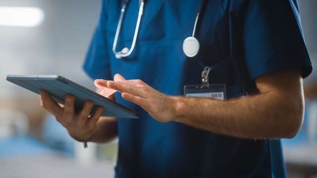 Nurse using tablet