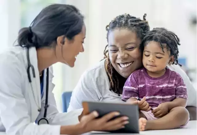 Nurse talking to patients