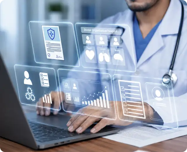 A doctor working on a computer