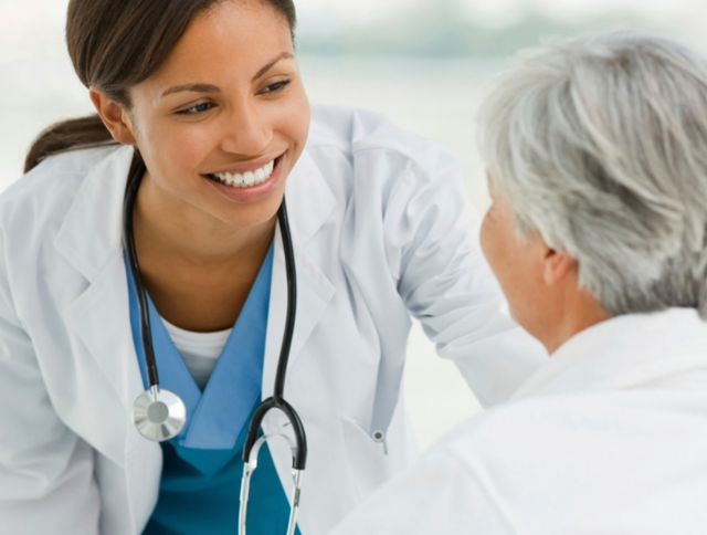 Nurse speaking to patient