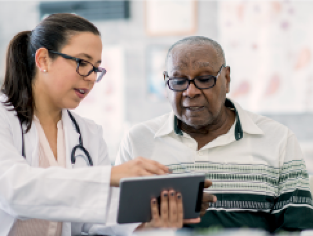 Doctor speaking with patient