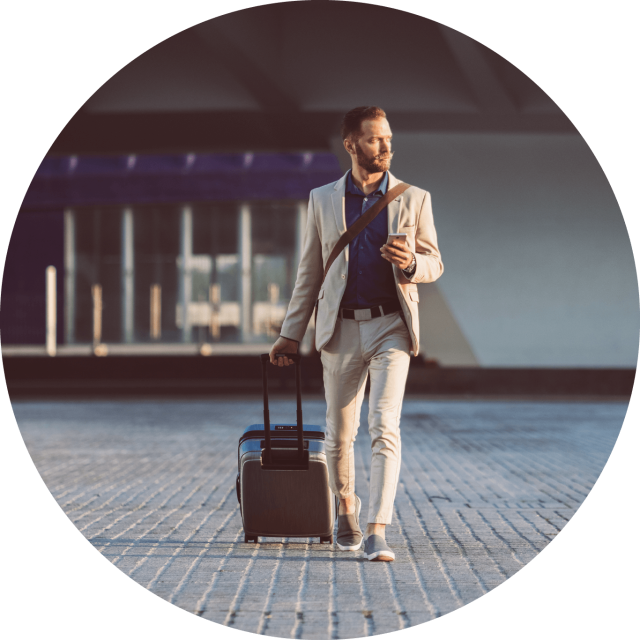 Man walking and holding a suit case