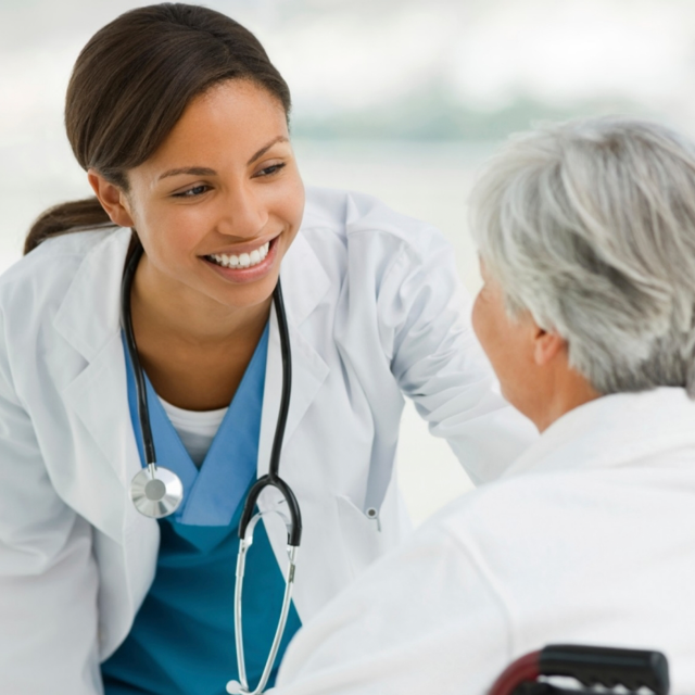 Nurse speaking to patient