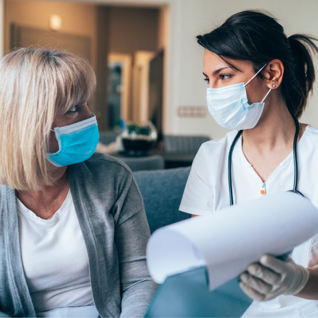 Nurse speaking to patient