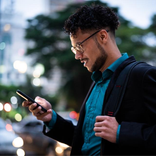 Man staring at cell phone