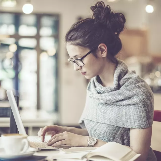 Woman working in coffee shop