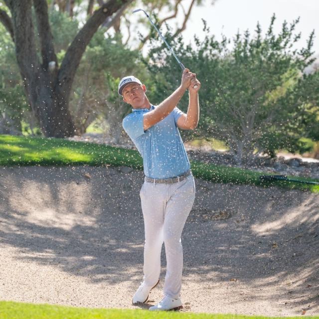 Seamus Powers golfing